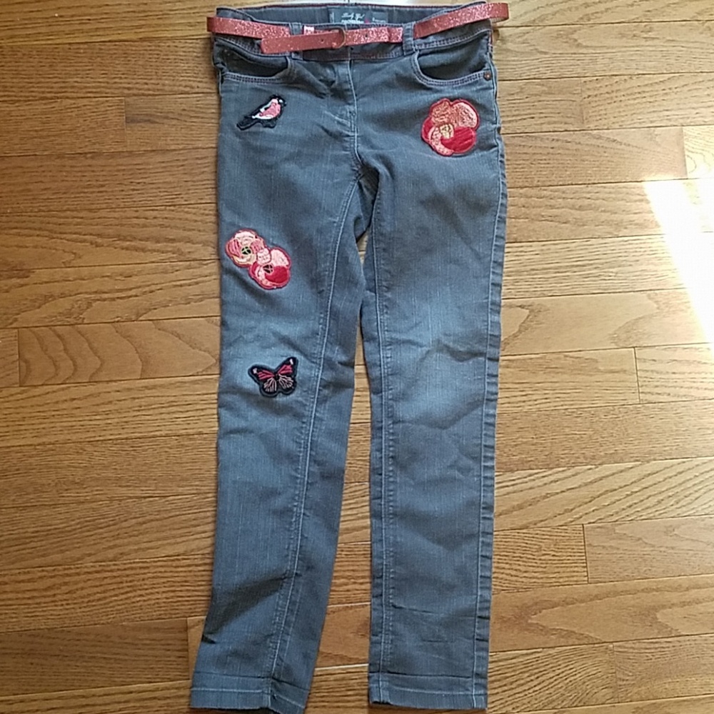 Gray jeans with flower, bird, and butterfly embroi